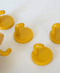 Vintage Yellow Plastic Coat Hook: Mid Century Modern Wall Decor