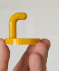 Vintage Yellow Plastic Coat Hook: Mid Century Modern Wall Decor