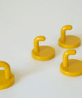 Vintage Yellow Plastic Coat Hook: Mid Century Modern Wall Decor