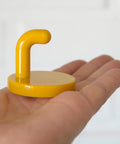 Vintage Yellow Plastic Coat Hook: Mid Century Modern Wall Decor