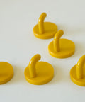Vintage Yellow Plastic Coat Hook: Mid Century Modern Wall Decor