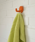 Vintage Orange Plastic Coat Hook: Mid Century Modern Wall Decor (NOS)