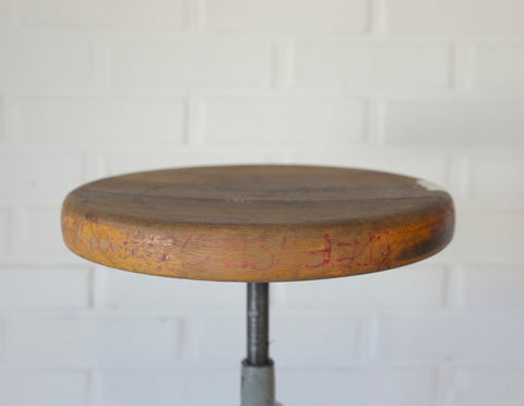 Vintage Industrial Stool: Adjustable Swivel, Rustic Plant Stand