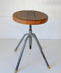 Vintage Industrial Stool: Adjustable Swivel, Rustic Plant Stand