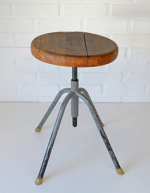 Vintage Industrial Stool: Adjustable Swivel, Rustic Plant Stand