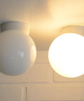 Pair of Vintage Yugoslav Globe Sconces, Mid-Century Modern Flush Mount Lights